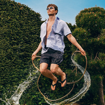 Communicates an energetic, carefree summer lifestyle, promoting comfort and freedom associated with casual warm‑weather clothing during outdoor leisure.